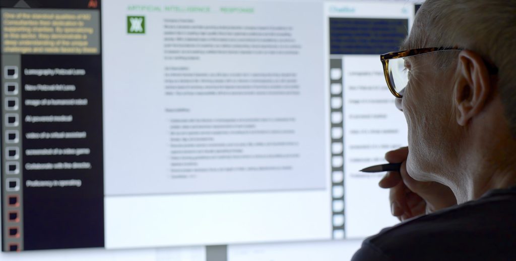 Investor reading financial data from a computer monitor