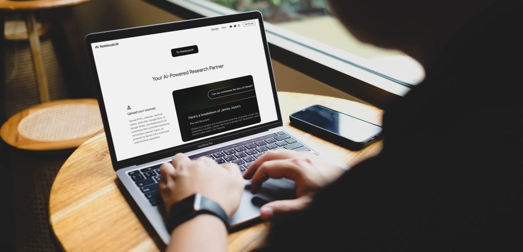 Student using AI for research on a laptop